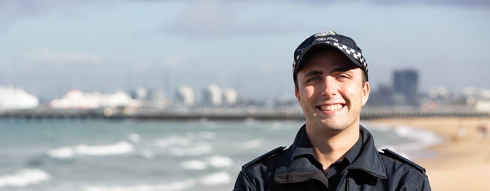 Young officer on the beach