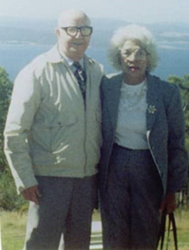 Joseph Shackelton and May Rosser standing together