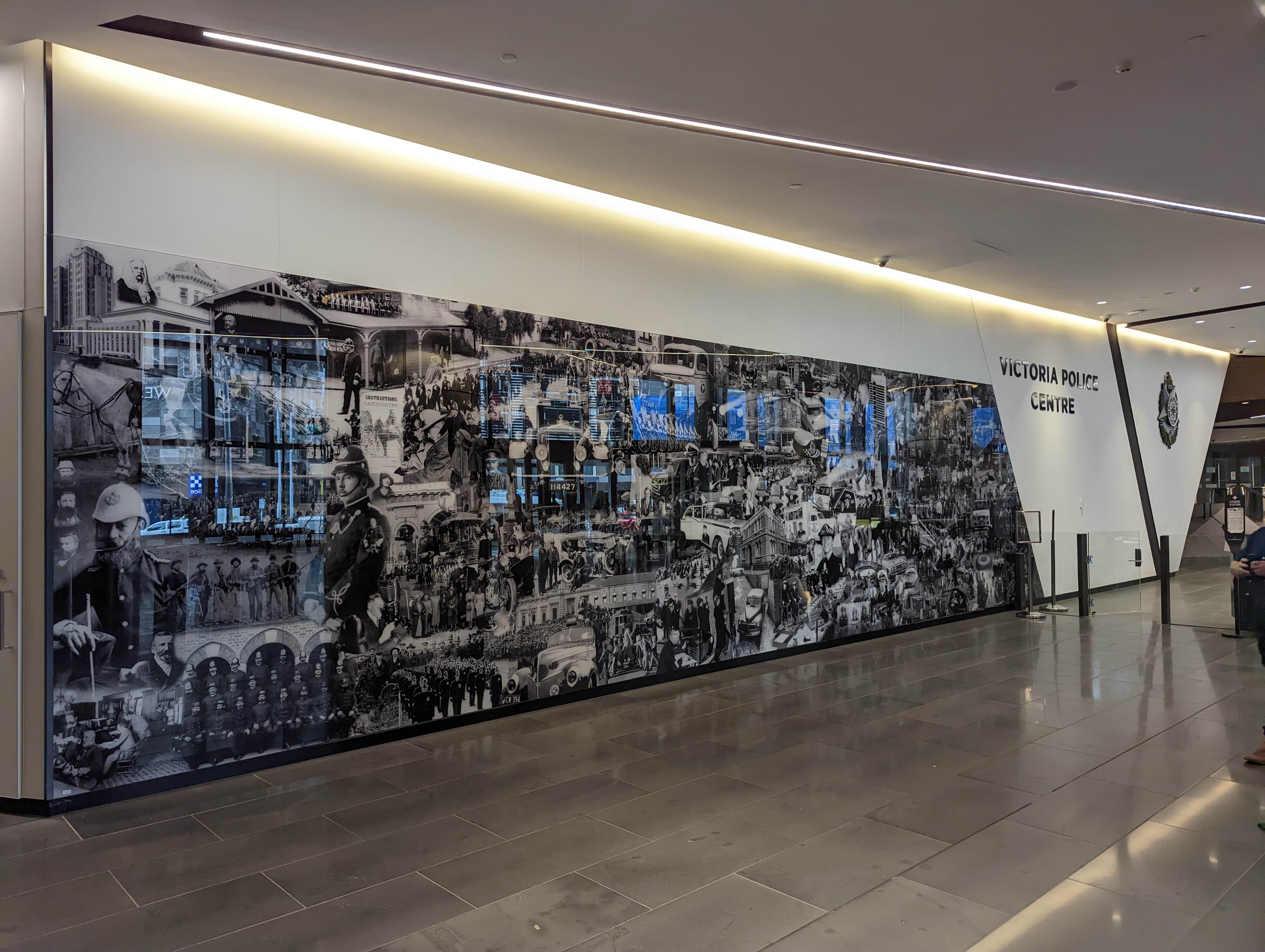 A picture of the Victoria Police Interactive Mural on the wall of the Victoria Police Centre foyer. 