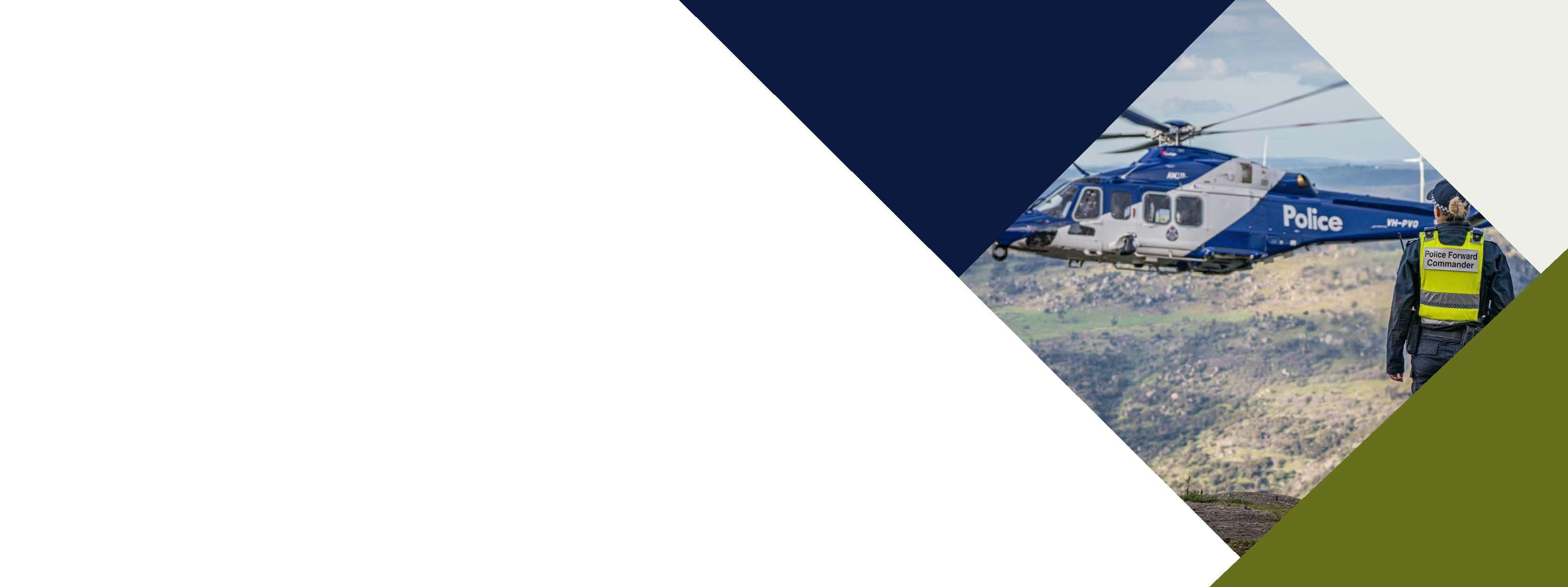 Decorative banner image of a police officer over looking a cliff and a police helicopter. 