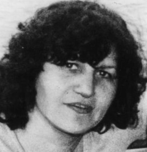 Maria James, with short curly hair, facing the camera. 