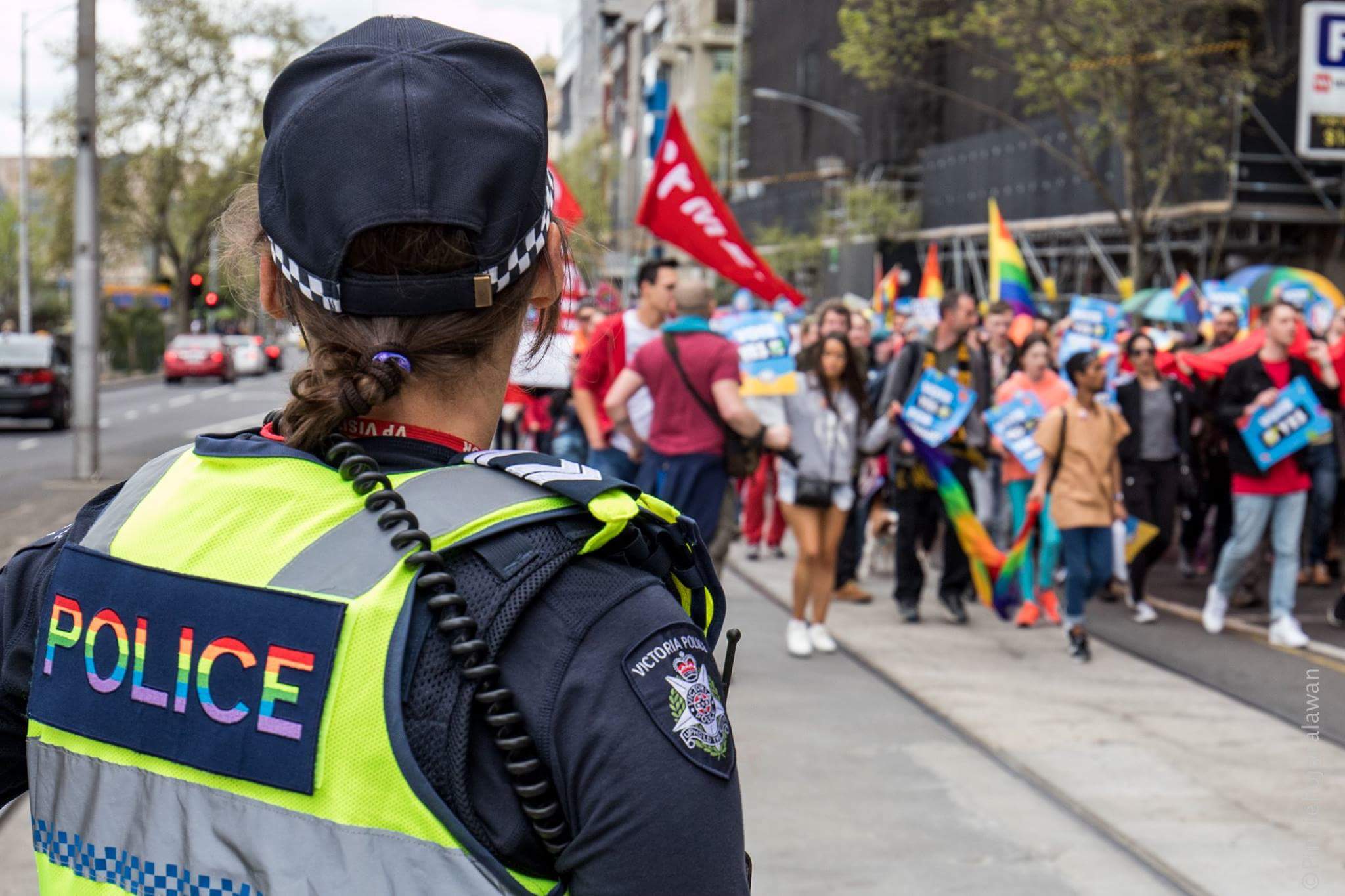 An LLO watches on at a community event