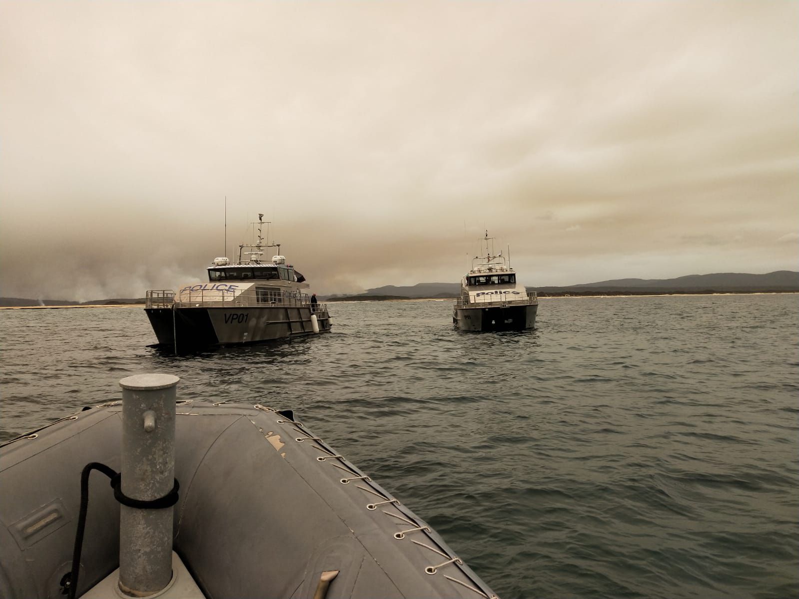 Victorian bushfires 2019-2020 - Two police boats on water