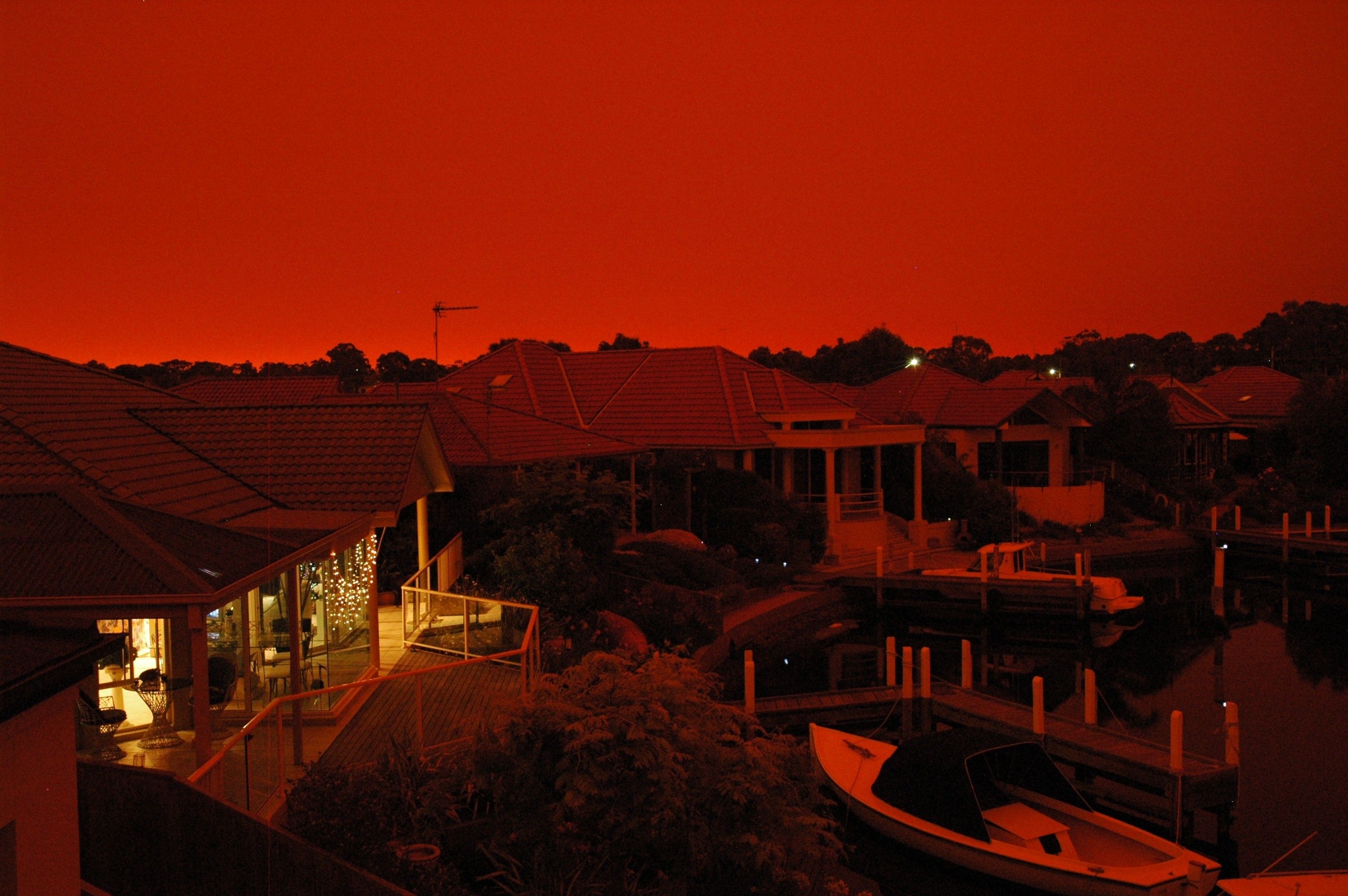 Victoria bushfires 2019-2020 - Red bushfire sky above property in East Gippsland