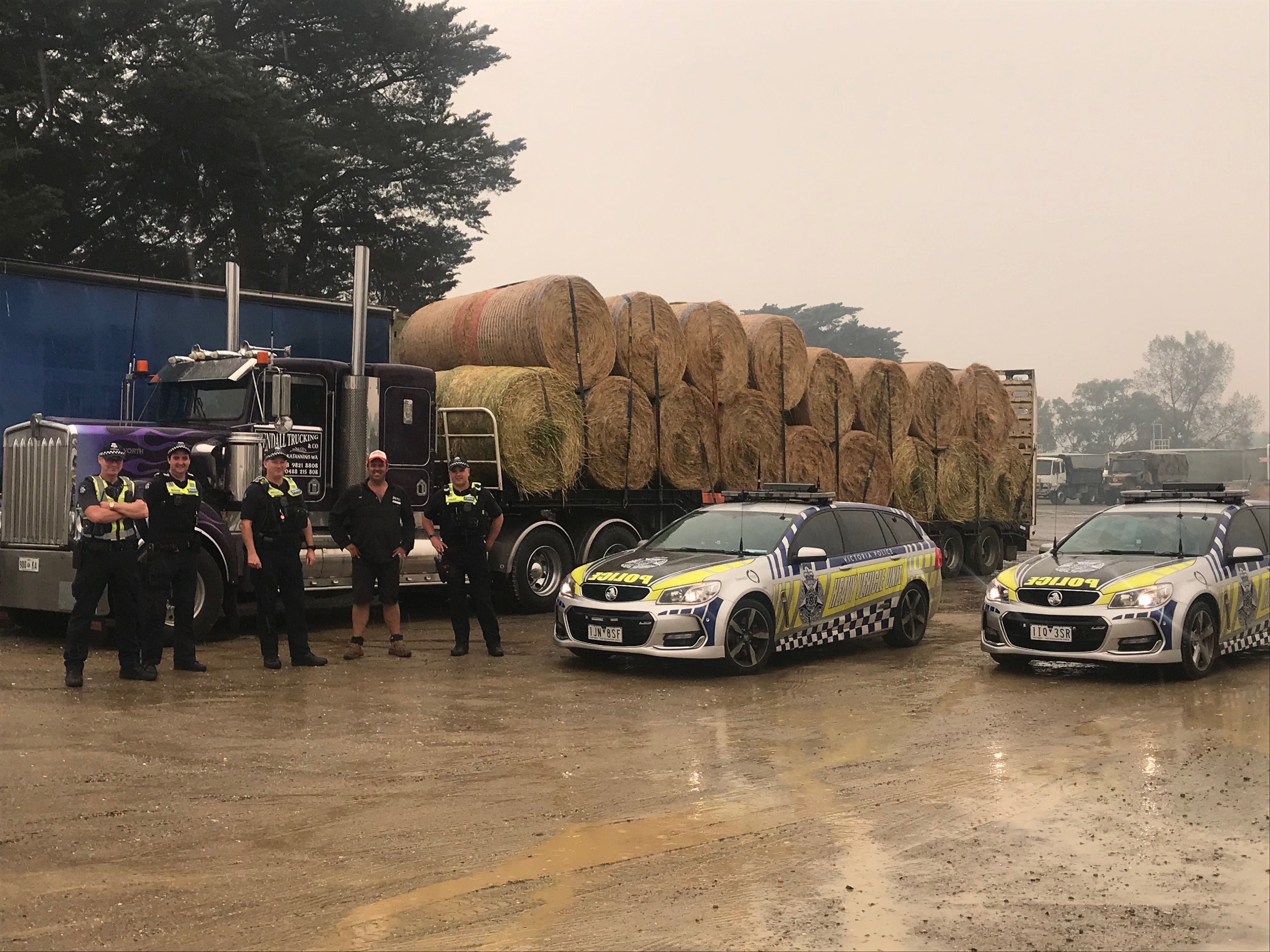 Victorian bushfires 2019-2020 - Heavy vehicle unit cars and a hay truck loaded with bales