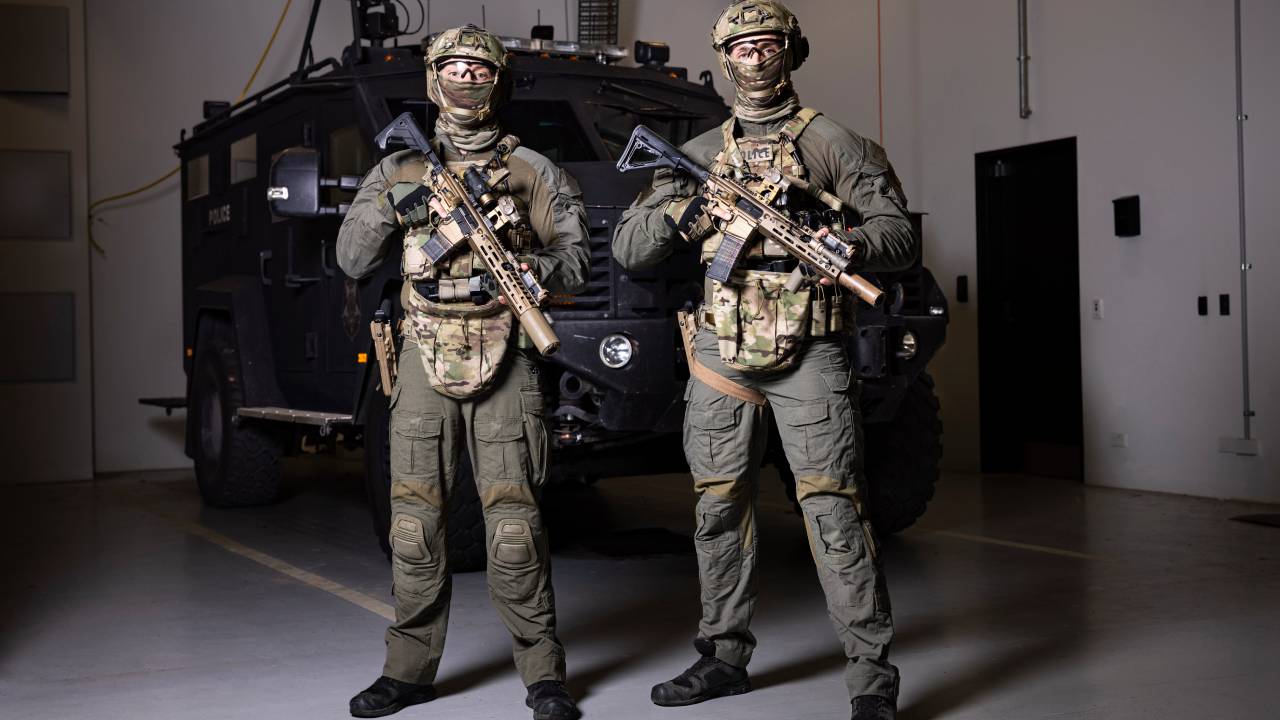 About us - Police Life podcast - Special ops - two full uniform officers with guns